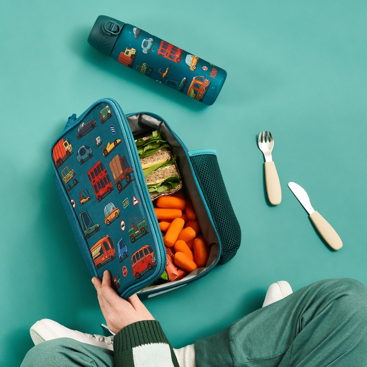 ION8 Automobiles lunch bag and bottle set in use at lunchtime