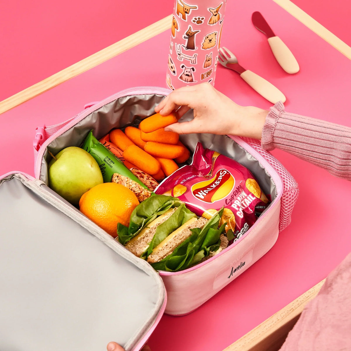 ION8 Dogs lunch bag and bottle set in use, packed with a healthy lunch
