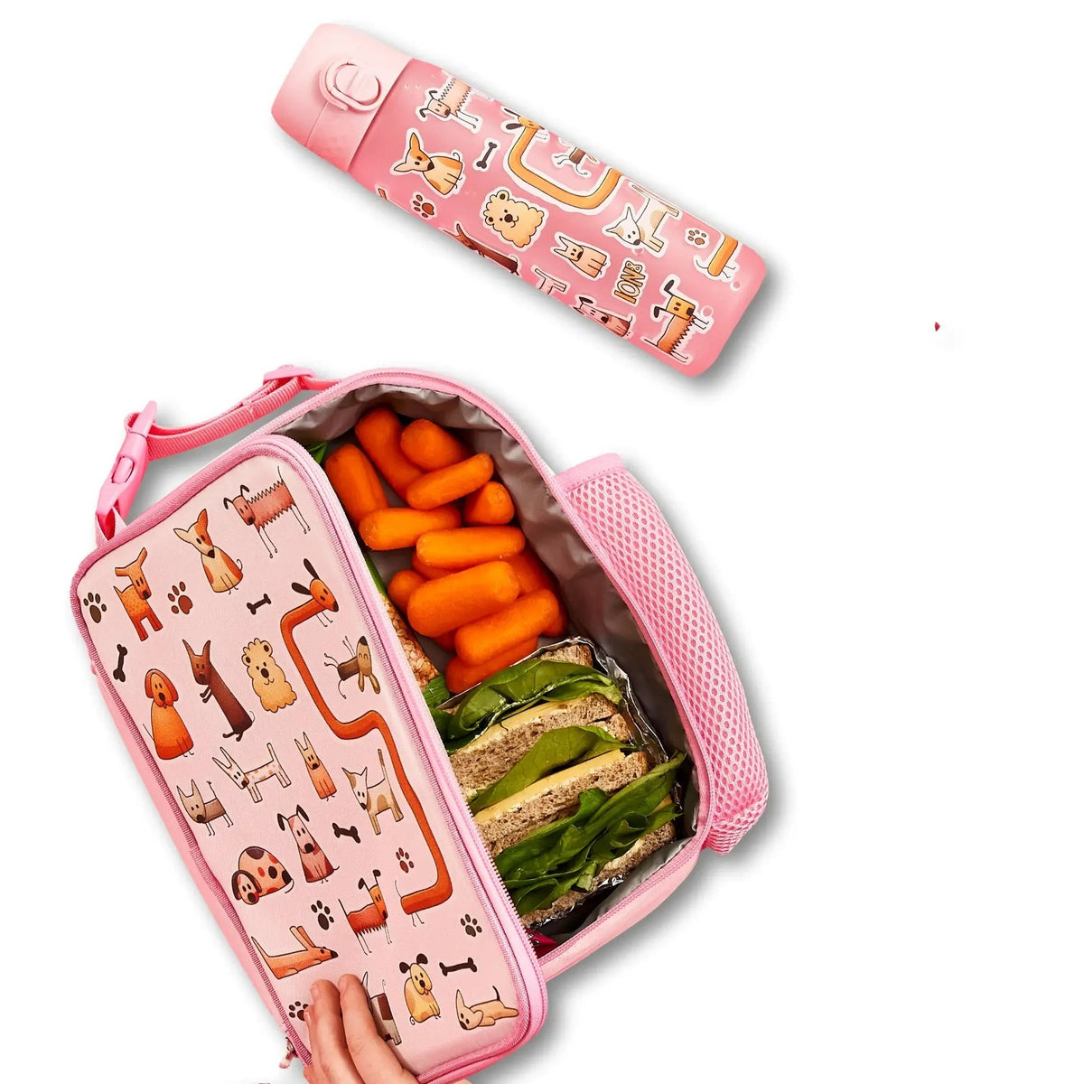 ION8 Dogs insulated lunch bag open with a packed lunch, next to the matching dogs water bottle