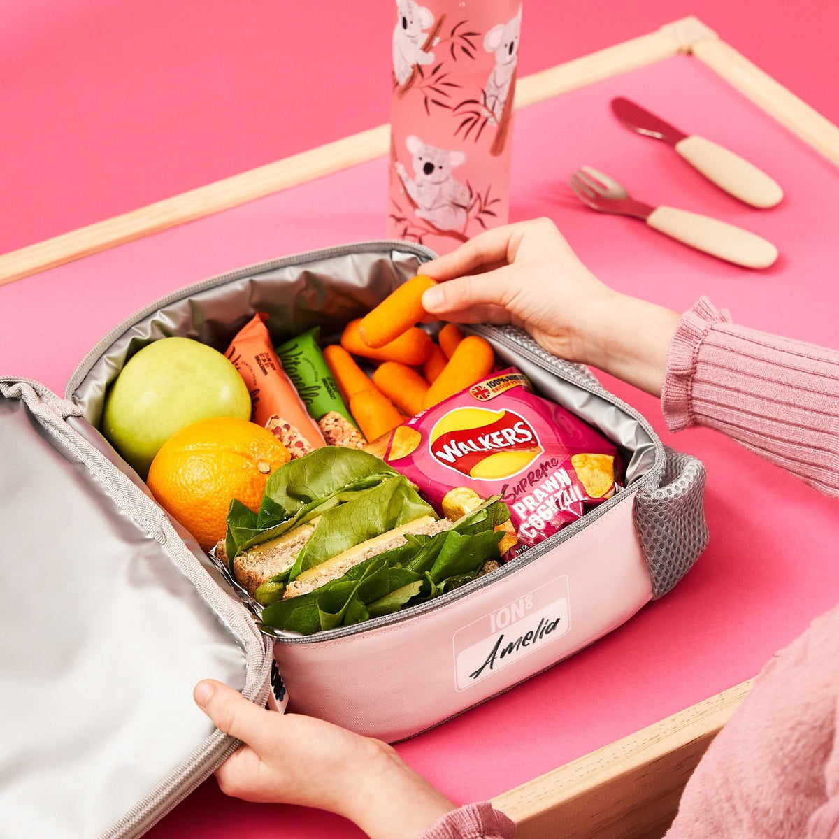 ION8 Koala lunch bag and bottle set in use, packed with a healthy lunch