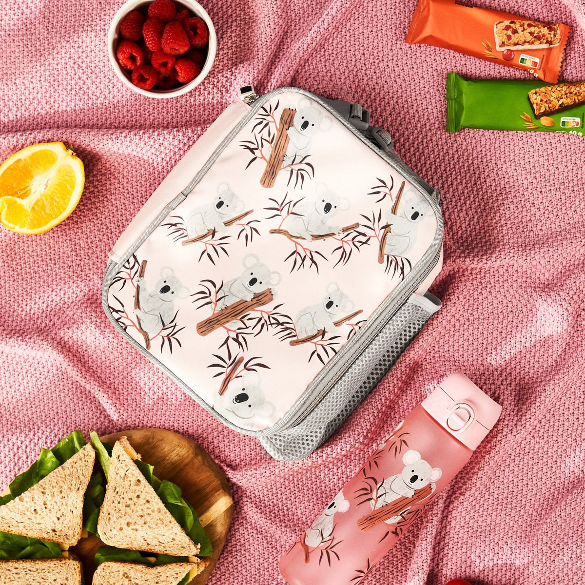 ION8 Koala lunch bag and bottle set in use on a picnic