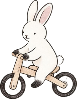 Rabbit riding a wooden balance bike