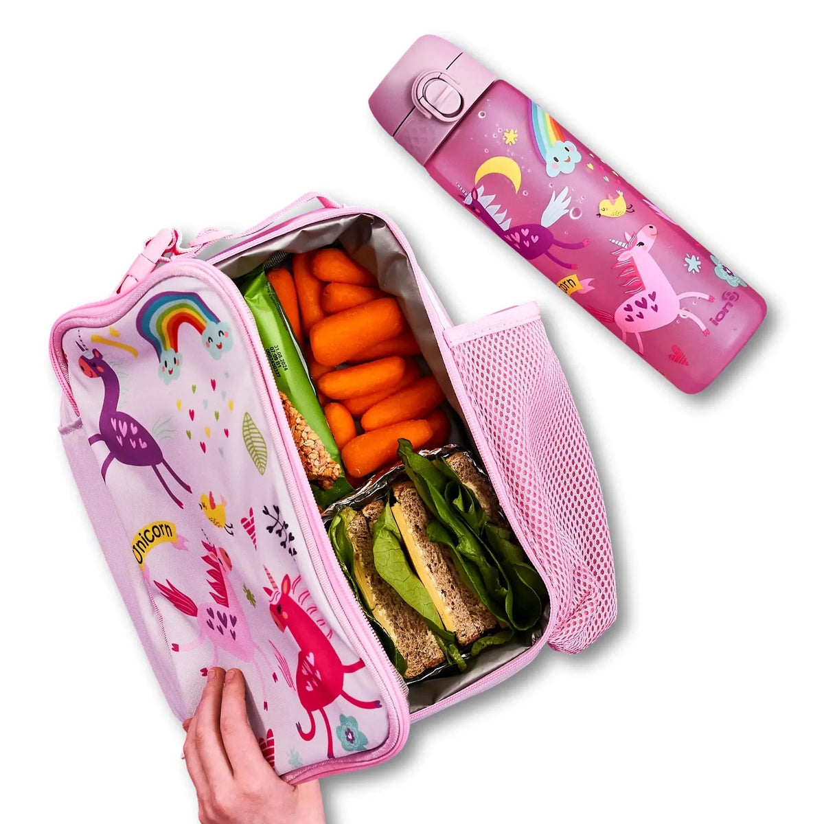 ION8 Unicorns insulated lunch bag open with a packed lunch, next to the matching unicorns water bottle
