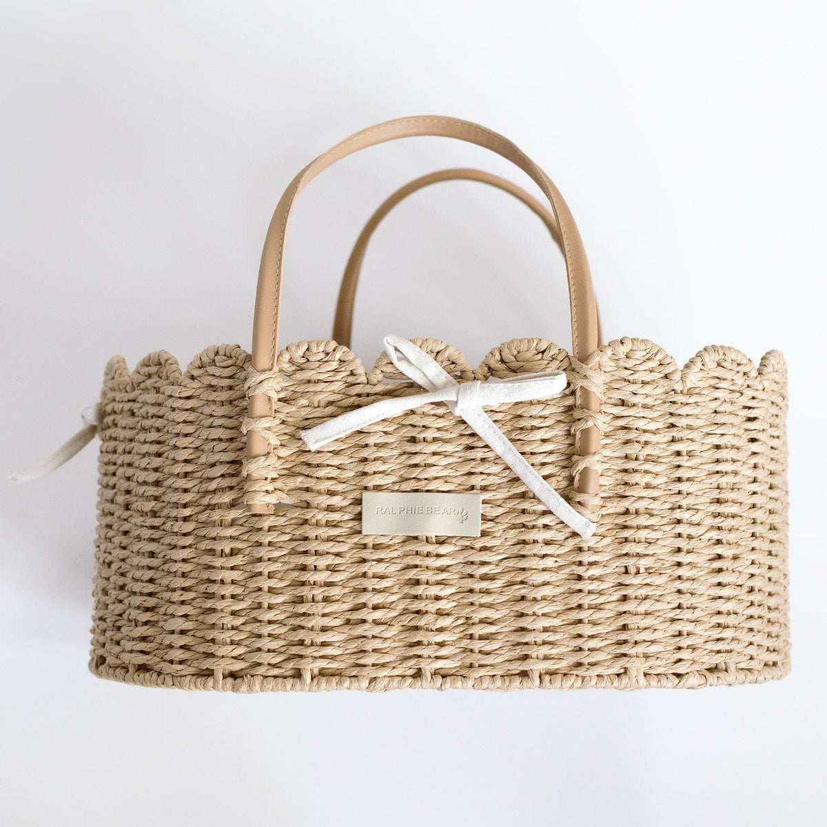 Scallop edge nappy caddy basket with a bow